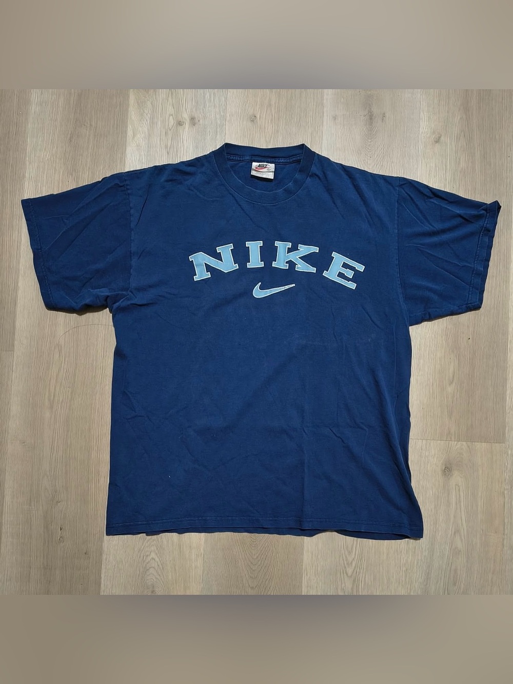 Vintage Nike Arch Spellout Center Men Navy Blue Graphic Tee with Light Blue Logo